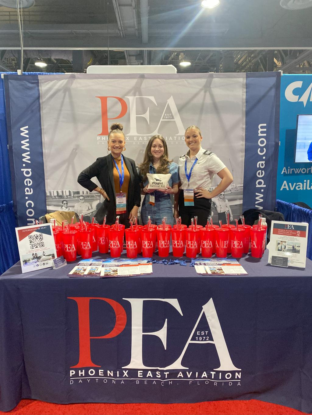 Winner of Merch giveaway,Peyton Shuster, pictured with Amelie Coleman, Admissions Manager and Sara Mohlin, Marketing Manger, in Long Beach, CA