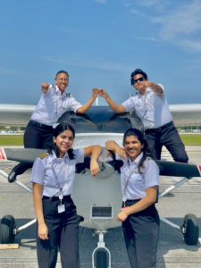Xochitl with other female pilots on KFIN ramp in front of Cessna 172