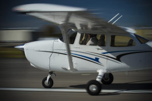 Cessna 172 Skyhawk action shot of pilot taking off