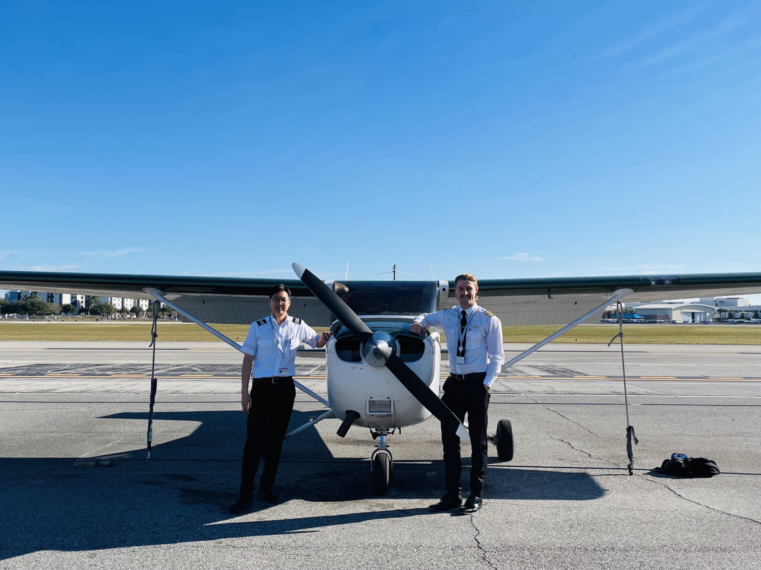 Brenton Scott Martin (on the right) with his student, Jaesung Sohn (on the left) after the successful completion of his first solo