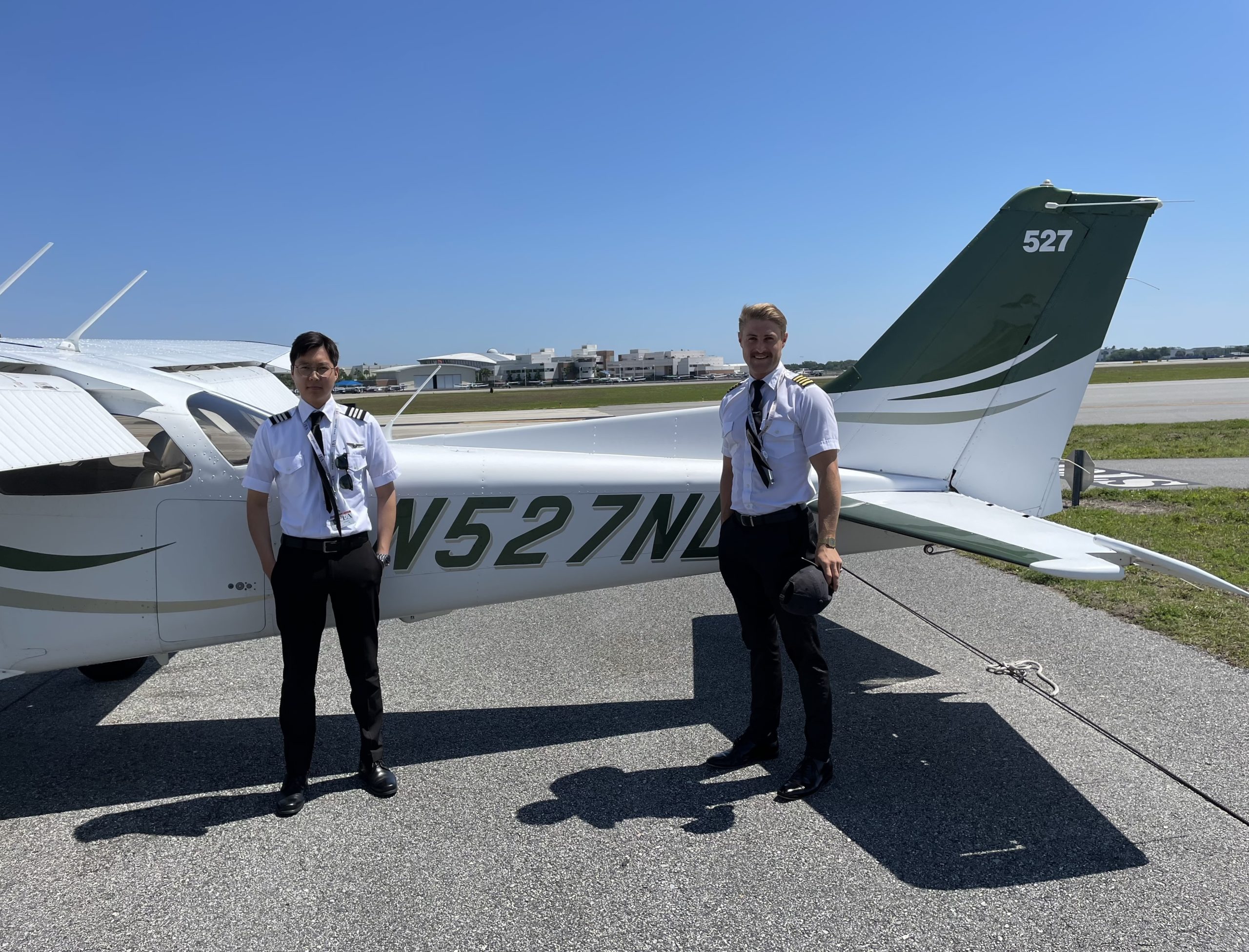 Jaesung Sohn (on the left) with Brenton Scott Martin (on the right) in front of Cessna 172 N527ND
