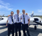Brenton Scott Martin and his two students, Keegan Pienaar and Reny Boluarte. His two students were the first to complete their Multi Engine in PEA's newly modernized Piper Senecas
