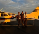 Ashish Raj and Tegvir Anand next to Cessna 172 during sunset on KFIN tarmac