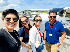 Frans with her family in front of Cessna 172 on ramp of PEA