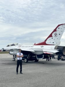 Omar Algazar next to United States Air Force Thunderbird