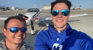 Dan Zagorii and Dylan selfie in front of Cirrus