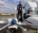 Dan Zagorii standing next to DA42 with canopy open