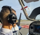 OTS of Omar Algazar sitting in right seat of Diamond DA42