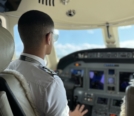 Omar Algazar OTS sitting in flight deck of aircraft