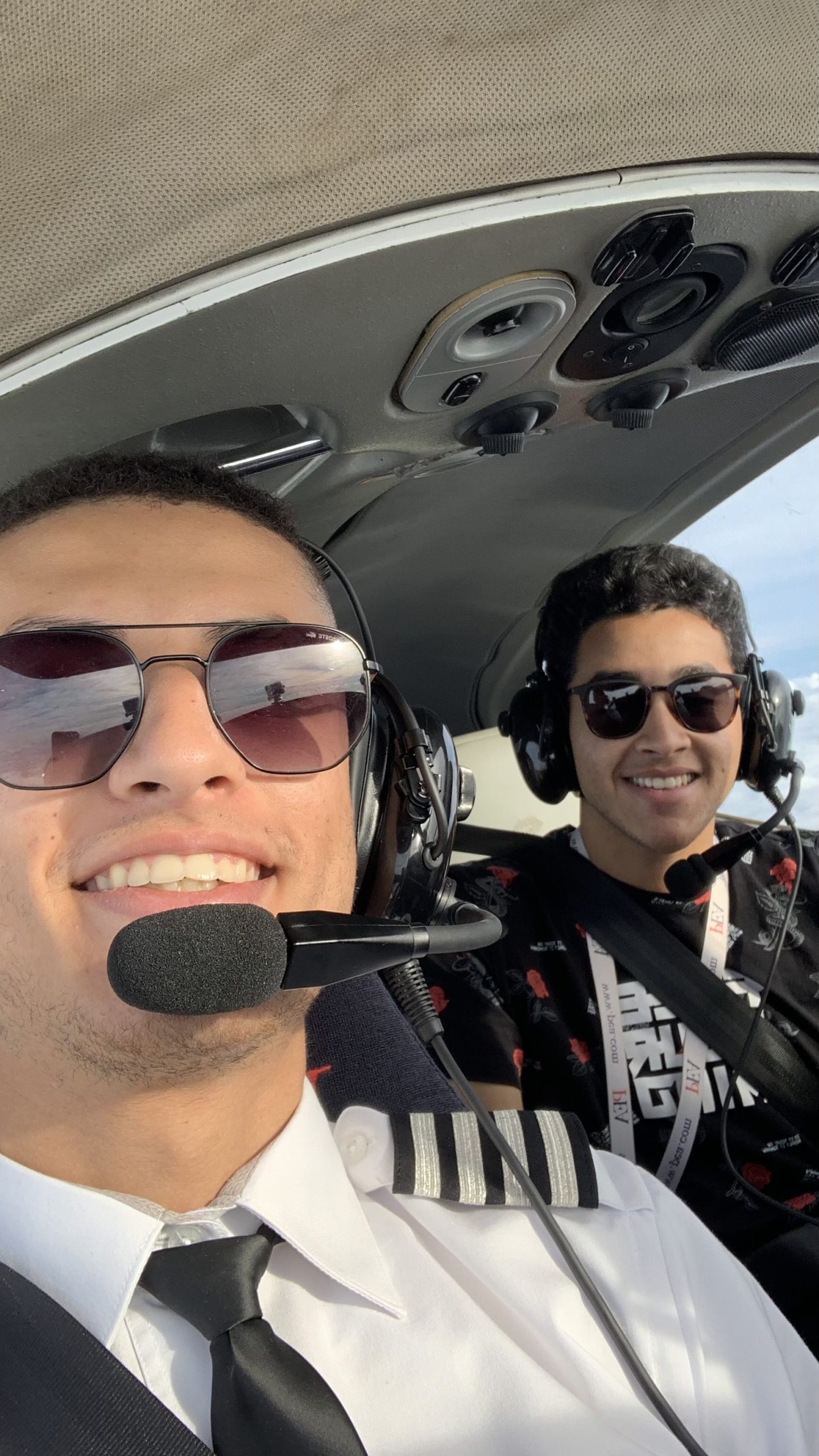 Omar Algazar photo with friend in flight