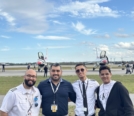 alt text=group shot of Omar (second one from the right) with friends in front of US Air Force Thunderbirds