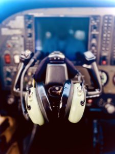 Headset on yoke of Cessna 172